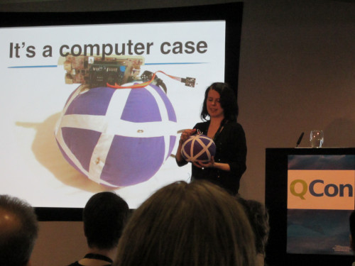 Holly about to throw her app server ball whilst presenting at QCon